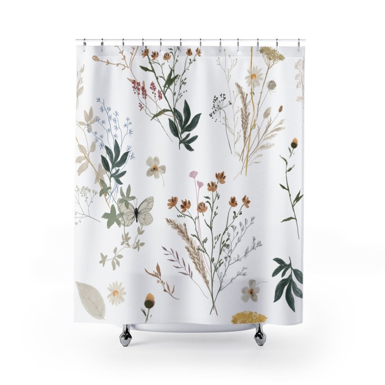 May include: White shower curtain with a floral pattern featuring various shades of brown, green, and blue. The pattern includes leaves, flowers, and a butterfly.