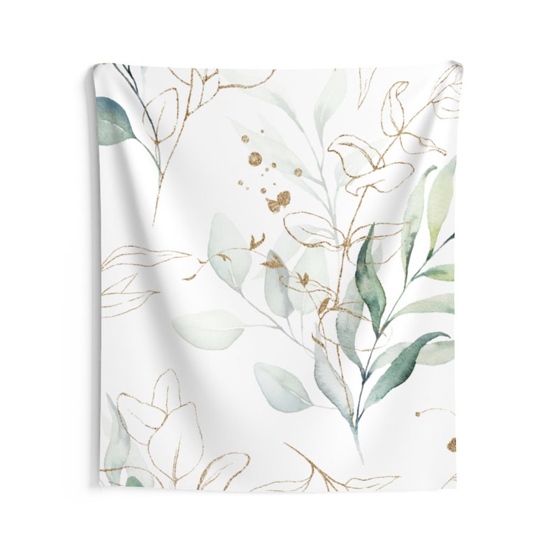 May include: A white tapestry with a repeating pattern of green and gold watercolor leaves and branches. The leaves are in shades of green and the branches are outlined in gold.