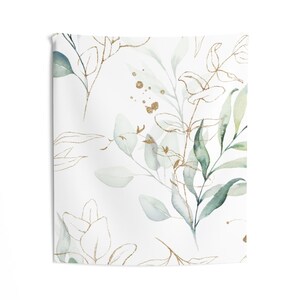 May include: A white tapestry with a repeating pattern of green and gold watercolor leaves and branches.