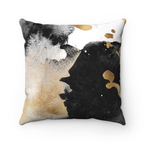 Funda de cojín decorativa con acuarela abstracta: degradado en negro, blanco y dorado.