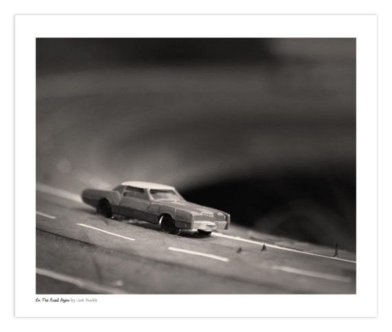 On The Road Again - Close Up Miniature Toy Car Art on Giant Tire