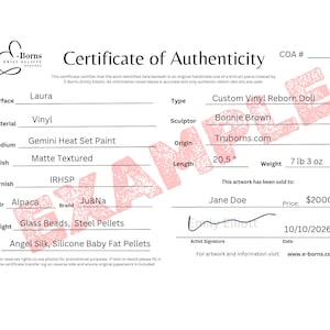 May include: A white Certificate of Authenticity document for a custom vinyl reborn doll named Laura. The form includes fields for material, medium, finish, varnish, hair, weight, fill, sculptor, and length of 20.5 inches and 7 lb 3 oz.