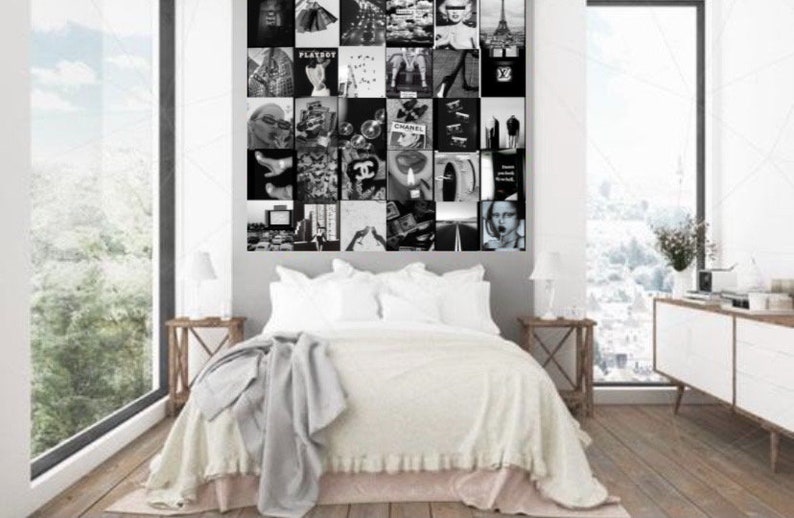 May include: A black and white collage of images featuring fashion, cityscapes, and iconic logos, such as Chanel and Playboy, displayed on a wall above a white bed with a grey blanket.
