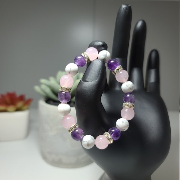 Amethyst, White Howlite, and Rose Quartz beaded bracelet with Crystal Spacer.