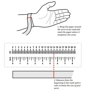 May include: A diagram showing how to measure your wrist for a bracelet. Wrap a piece of paper around your wrist and mark where it overlaps. Then, measure the length of the paper with a ruler. The ruler shows measurements in inches and centimetres.