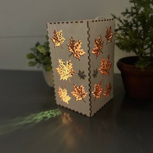 Handcrafted wooden fall tea, leaf lantern