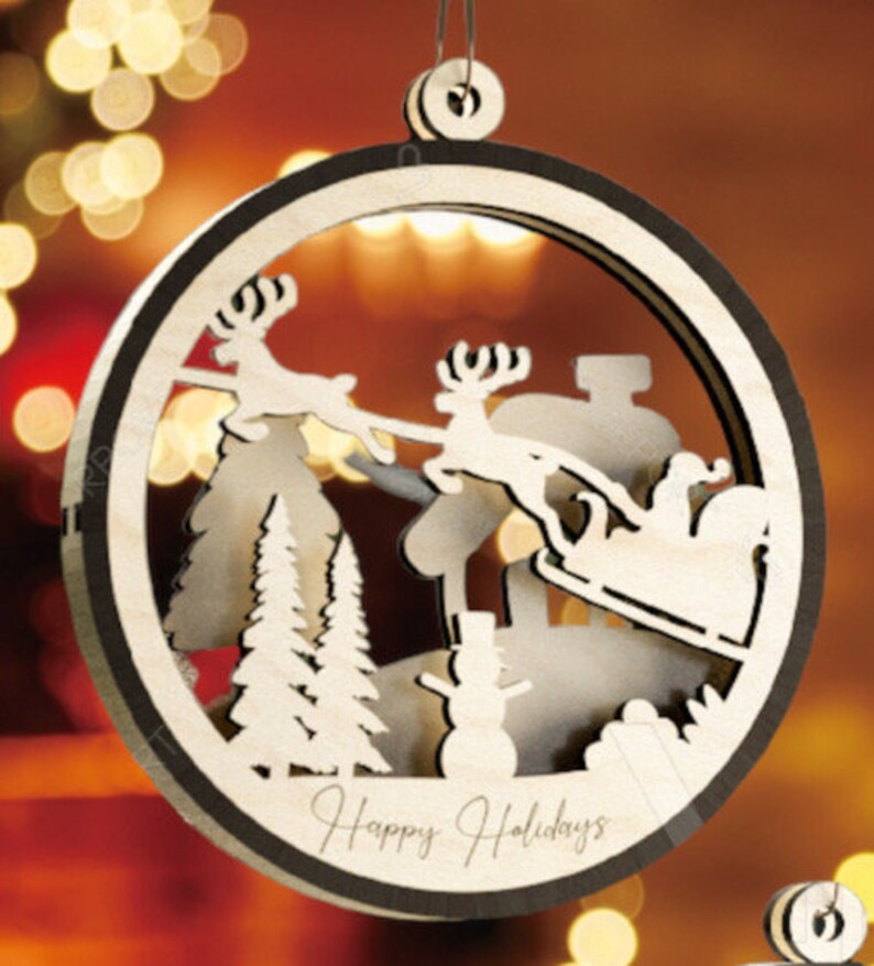 This is a Round Wooden Christmas Ornament With a Winter Scene With a ...