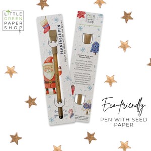 May include: A Christmas-themed plantable pen with a Santa Claus illustration. The pen is made of seed paper and can be planted to grow a small plant. The packaging includes instructions on how to plant the pen. The text on the packaging reads "Plantable Pen, Plant me and watch me grow!" and "You can plant this pen and paper".