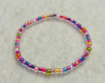 Bracelet en perles de rocaille rose bonbon | Bijou élastique arc-en-ciel