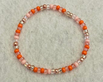 Bracelet en perles de corail et roses | Bijou élastique fait main