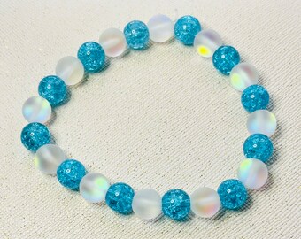 Bracelet élastique de 18 cm (7 pouces) avec perles sirène bleues craquelées et blanches |