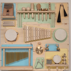 Montessori music wall board with percussion instruments