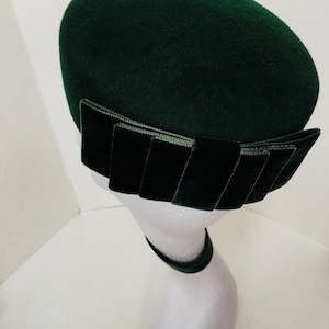 Gilda - Wool pillbox with velvet bow .