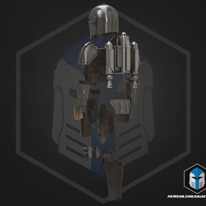 May include: A disassembled silver and brown Mandalorian armor set, including a helmet, chest plate, shoulder pads, and leg armor. The armor is displayed against a dark background with a blue and gray outline. The image includes the text "PATREON.COM/GALACTICARMORY".