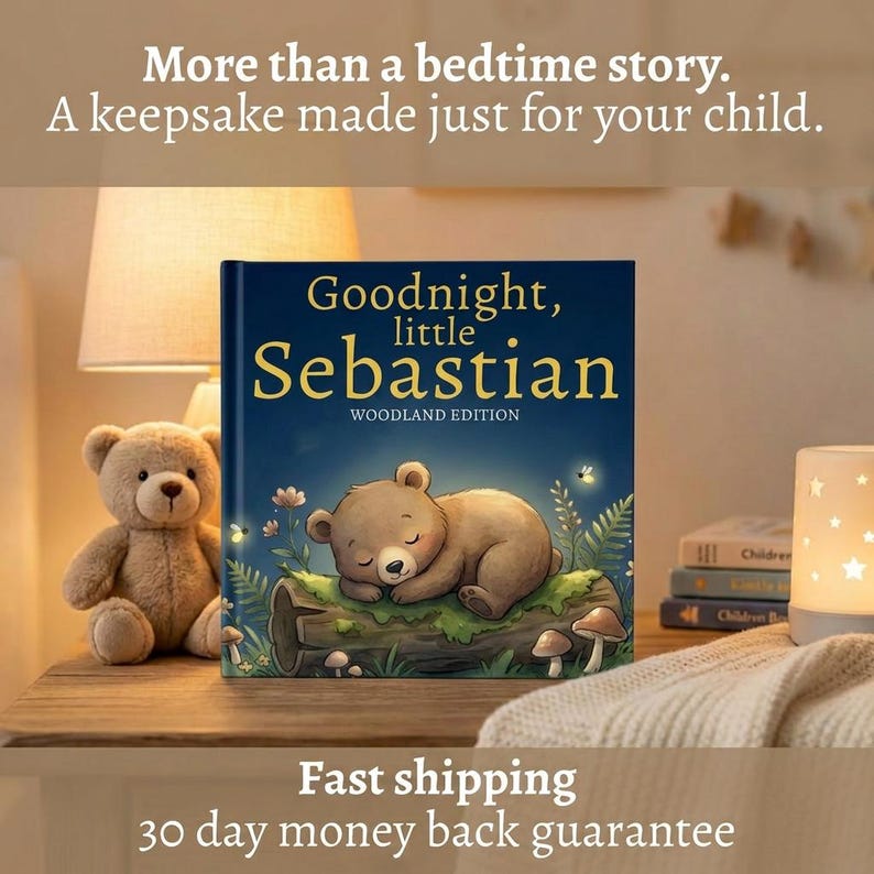 May include: A children's book titled "Goodnight, little Sebastian" with a sleeping bear illustration. A teddy bear and a star-shaped night light are on a wooden table. The text reads "More than a bedtime story. A keepsake made just for your child."