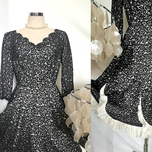 Vintage 50&#39;s zwart kant fit en flare jurk met bias cut plissé trim, pinup jurk