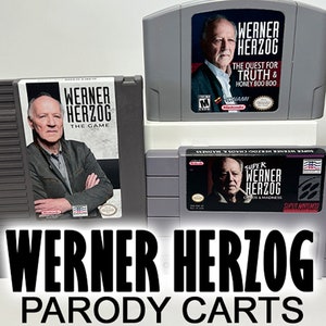 ヴェルナー・ヘルツォーク 任天堂カスタムパロディカートリッジ - NES、SNES、または N64 を選択。本物のカートリッジから作られています - 前面/背面ラベル - ドイツの映画監督