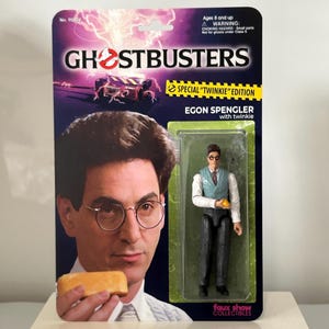 Ghostbusters Egon Spengler Custom Actionfigur mit Twinkie - Bootleg 80&#39;s Harold Ramis Charakter 1984 Ivan Reitman Film - 2-seitige Karte