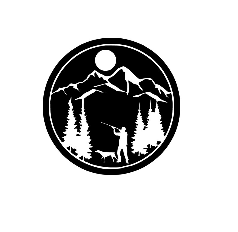 May include: Black and white silhouette of a hunter with a dog in a forest setting. The hunter is holding a rifle and is standing in front of a mountain range. There is a full moon in the sky.