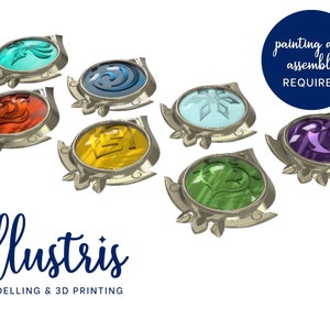 May include: Set of eight 3D printed, unpainted, gemstone-like pendants with various designs.  Each pendant features a silver-coloured metal frame.  The text "painting and assembly required" is visible in the image.