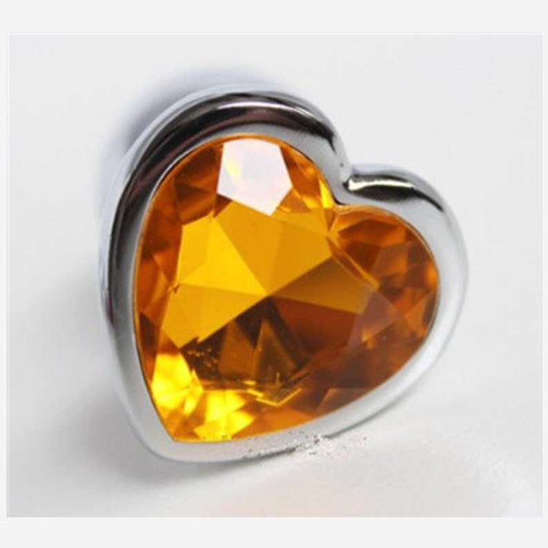 Анальная пробка с оранжевым кристаллом МиФ, фиолетовая 519-10 ORANGE-DD - МиФ - Анальные пробки со стразами - Купить