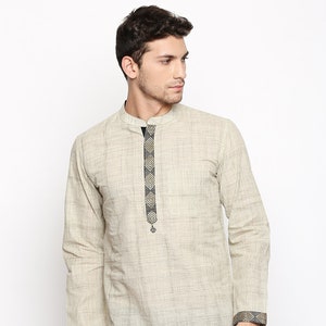 Indian contemporary men short kurta Beige cotton with black and golden border gents loose shirt mandarin collar image 1
