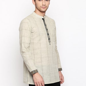 Indian contemporary men short kurta Beige cotton with black and golden border gents loose shirt mandarin collar image 4