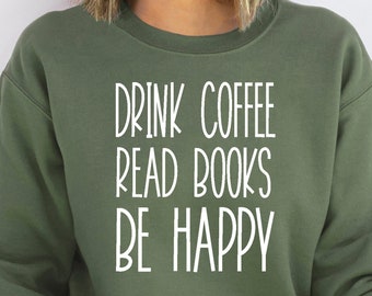 May include: A green sweatshirt with the text "DRINK COFFEE READ BOOKS BE HAPPY" in white.