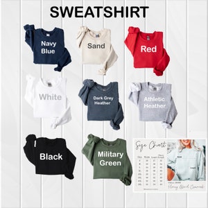 May include: A size chart for Gildan 18000 Heavy Blend Crewneck sweatshirts. The chart shows the width, length, and sleeve length in inches for sizes S-3XL. The image also shows nine different colour options for the sweatshirts: Navy Blue, Sand, Red, White, Dark Grey Heather, Athletic Heather, Black, Military Green, and a model wearing a white sweatshirt.