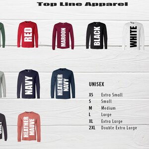 May include: Assortment of long-sleeve shirts in various colors, including red, black, and navy. Each shirt displays a color name in bold white text. The image also includes a size chart for unisex shirts, with chest measurements in inches.