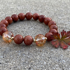 Beaded sandstone bracelet with glass bead accent!