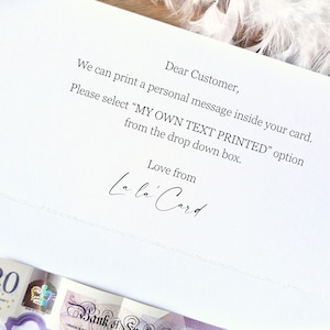 May include: A white card with printed text, including "Dear Customer" and instructions for a personalized message. The card is signed "Love from La la Card." A twenty-pound note is visible at the bottom.