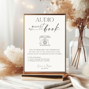 Op de afbeelding: Een rechthoekig bord met een gouden lijst met de tekst AUDIO guest book, een lijntekening van een draaischijftelefoon en de instructies: You've reached the Hendricks. We can't get to the phone right now, please leave the message after the beep!