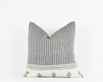 Zinnia - Woven black and white striped pillow cover with bottom motif