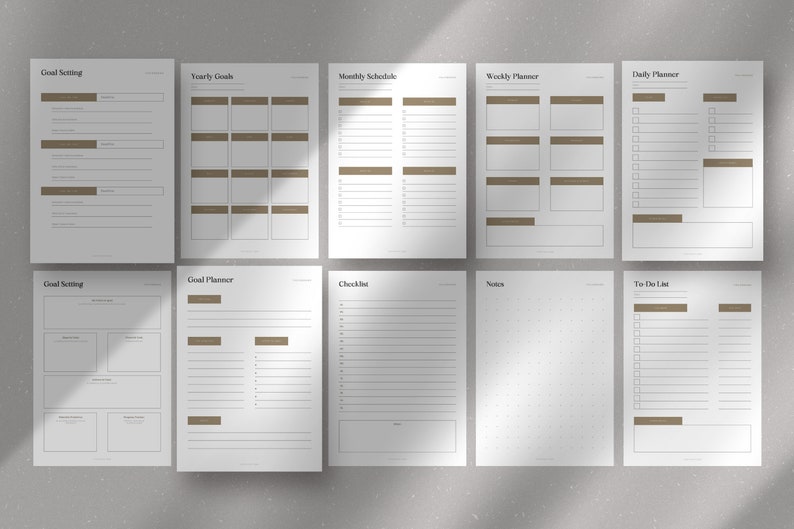 May include: A set of printable planner pages with headings for goal setting, yearly goals, monthly schedule, weekly planner, daily planner, goal planner, checklist, notes, and to do list.