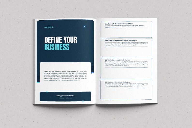 Op de afbeelding: Een open boek met de titel "DEFINE YOUR BUSINESS" in wit en teal op een donkerblauwe achtergrond. De pagina's van het boek bevatten tekst en prompts voor bedrijfsplanning, met een lichtgrijze achtergrond.