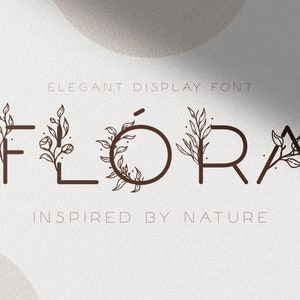 Flóra - A Delicate Floral Font With Elegant Handdrawn Flower Decorations