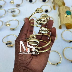 10 Cowrie shell bracelets ,African brass and cowrie bracelets , wholesale brass bracelets , African Brass jewelry ,wholesale brass jewelry