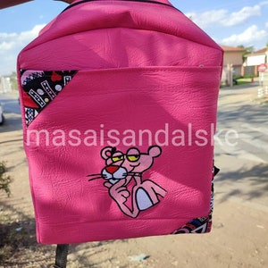 Pink panther backpack , Leather backpack , girls school bookpack , African print pink panther , pink backpack panther embroidered backpack .