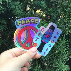 Holographic peace sign and lava lamp stickers