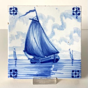 Antique Delft tile - Boat with a figure - Ca 1900 - Dutch - Ship - Blue and white - Delftware - Wall - Kitchen - Fireplace