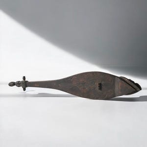 Tribal art instrument - Africa - Music - 20th century - Wood - Carved