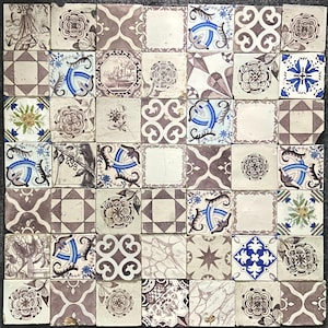 May include: A collection of antique square tiles with various patterns. The tiles feature floral, geometric, and architectural designs in shades of white, brown, and blue. Some tiles have a faded appearance, suggesting age and use.