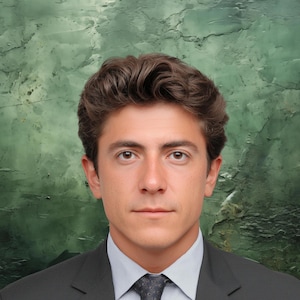 May include: A man in a dark gray suit with a light blue shirt and a patterned tie. The man has brown hair and eyes. The background is a textured, mottled green and brown.