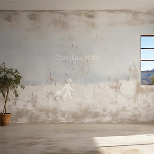 Pode incluir: Interior de um quarto com tinta descascando nas paredes, uma planta em vaso e uma janela com vista para as montanhas. O quarto tem piso de concreto e é banhado pela luz do sol. O texto "Travelling Matti" é visível.