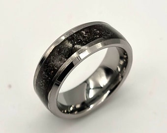 Handmade Tungsten and Meteorite ring. Set with real meteorite. This is all set on am 8 mm wide comfort fit band.
