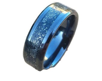 Beautiful handmade black ceramic ring. Set with genuine meteorite dust.