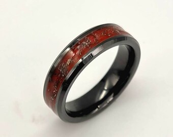 Meteorite set handmade black ceramic ring. Set with genuine meteorite dust.