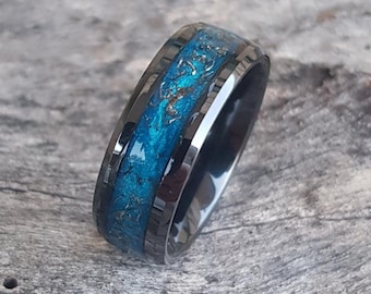 Handmade Meteorite black ceramic ring. Set with genuine meteorite dust