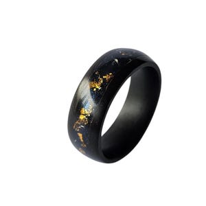 Ebony and meteorite and gold leaf